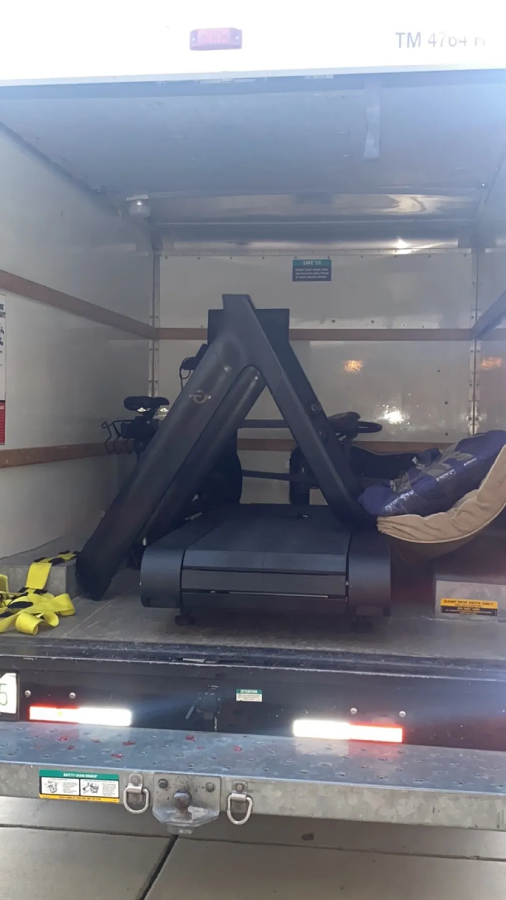Treadmill loaded and strapped in the truck